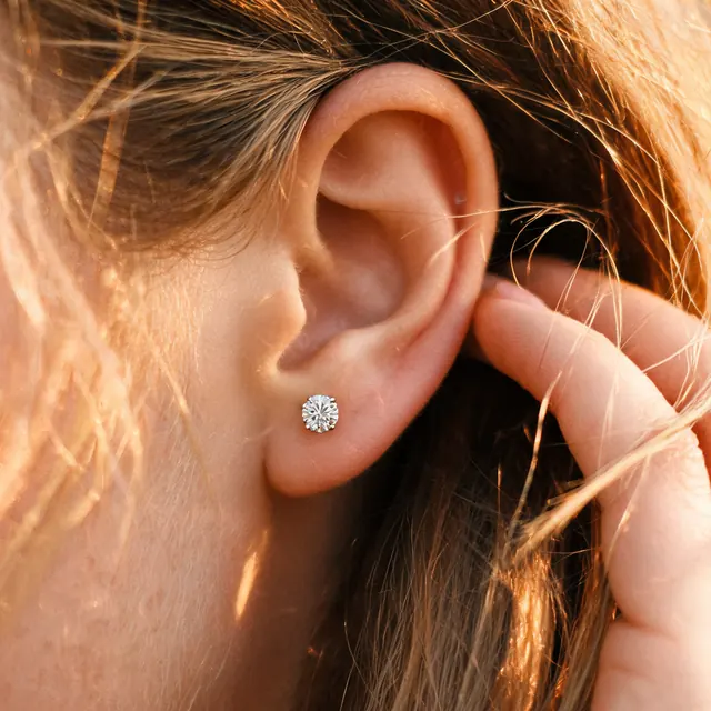 AI on ear image: stud sunlit, made by Grandior AI Studio