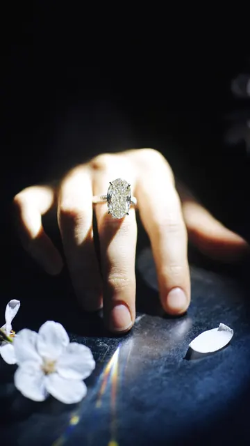 AI on hand image: oval ring night, made by Grandior AI Studio