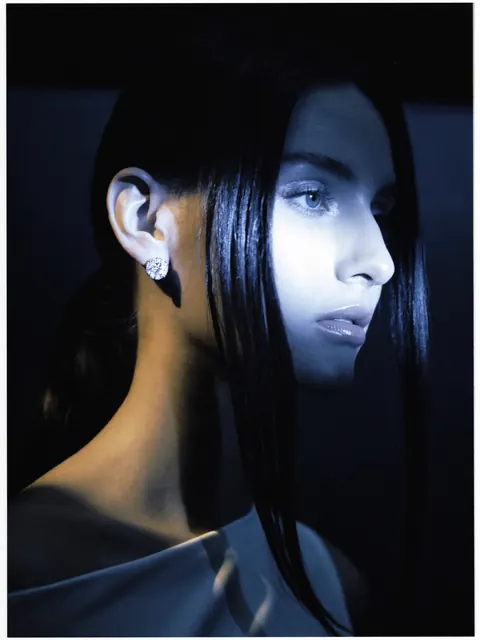 AI on model image: night earrings, made by Grandior AI Studio