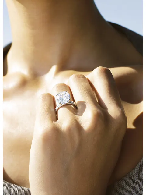 AI on hand image: pear ring shoulder, made by Grandior AI Studio