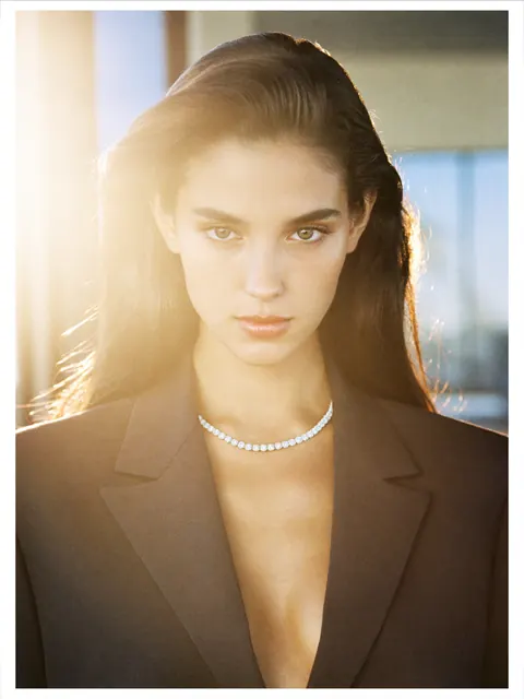 AI on model image: blazer necklace, made by Grandior AI Studio