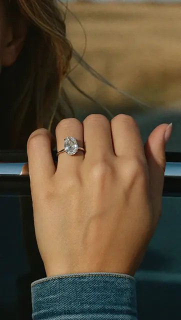 AI on hand image: oval ring car, made by Grandior AI Studio